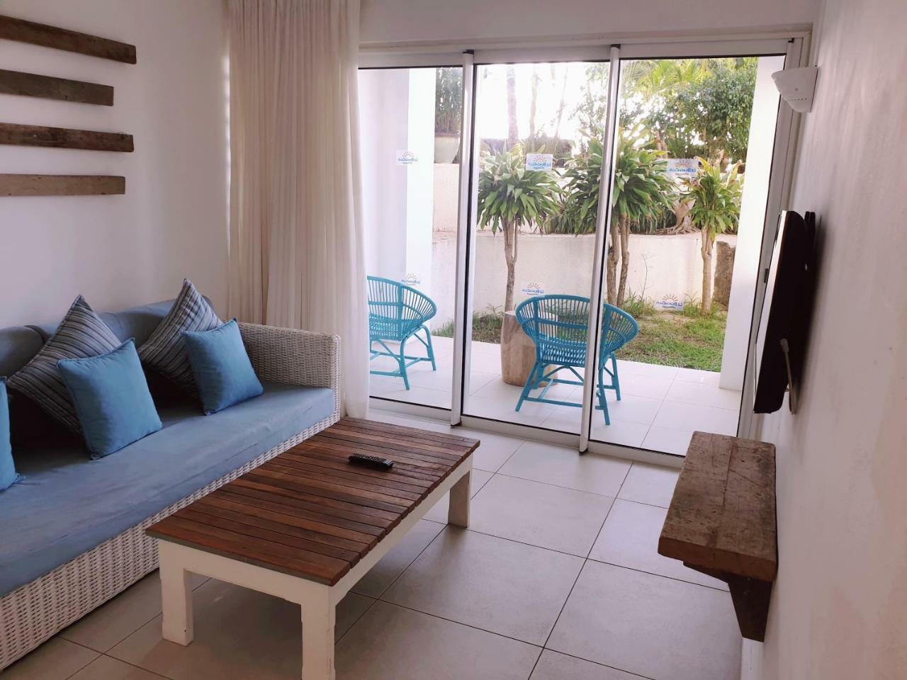Le Beachclub Pereybere Beach Buitenkant foto